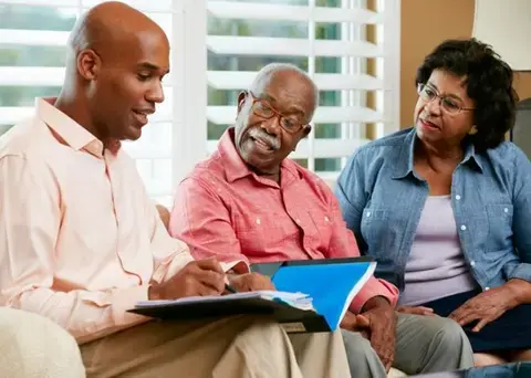 Family reviewing documents.